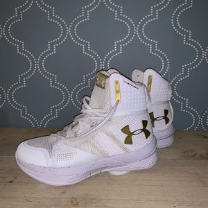 Women’s Under Armour volleyball high top sneakers.
